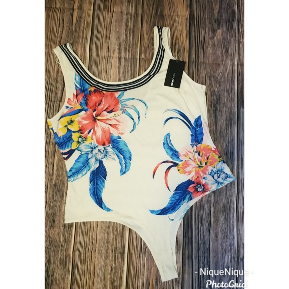 Top: Fashionova  off white tropical bodysuit tankScoop neckDEEP LOW cut back